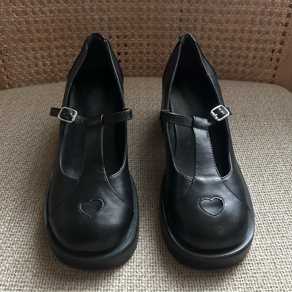 Delia’s Black Mary Jane shoes with heart cutout